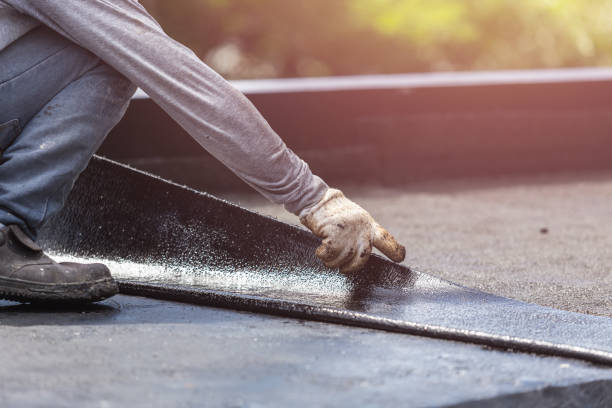 Professional Waterproofing technician working in Coalmont, IN